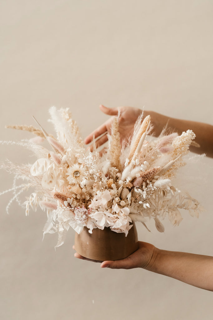 *nude* dried floral arrangement in camel ceramic vase