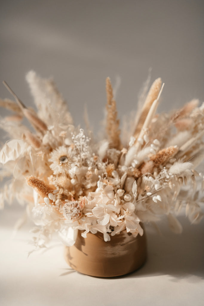 *nude* dried floral arrangement in camel ceramic vase