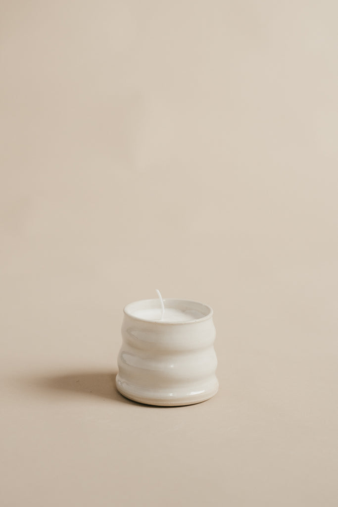 off white handmade ceramic candle